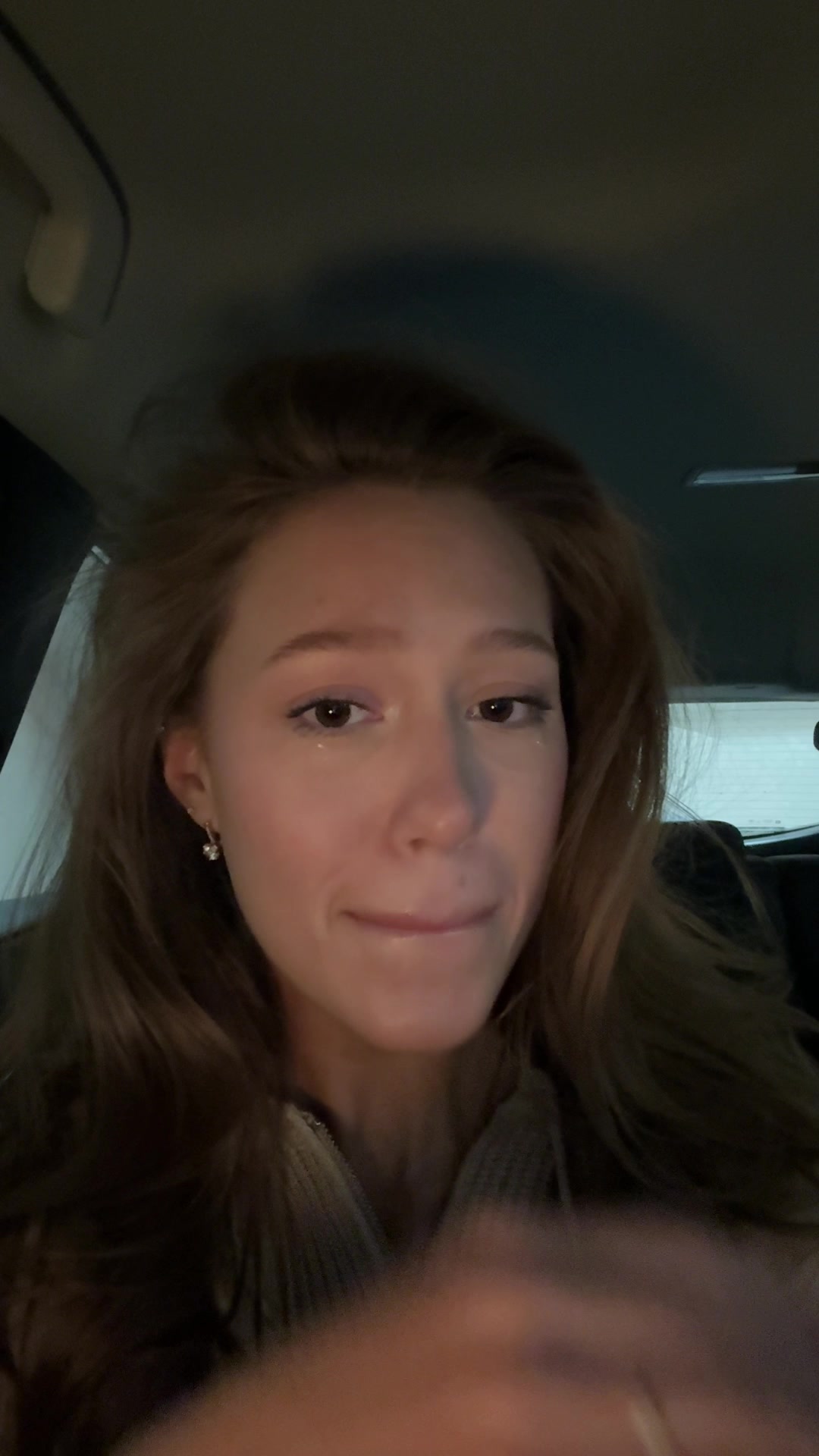 Woman Cries and Wipes Tears