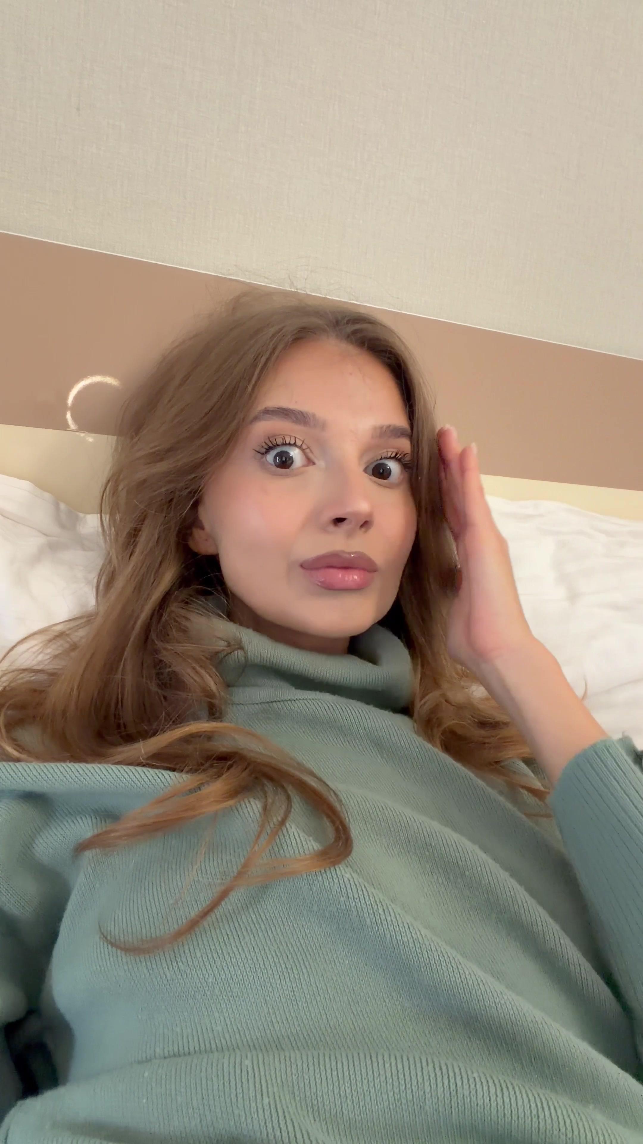 Woman Showing Shock and Covering Mouth