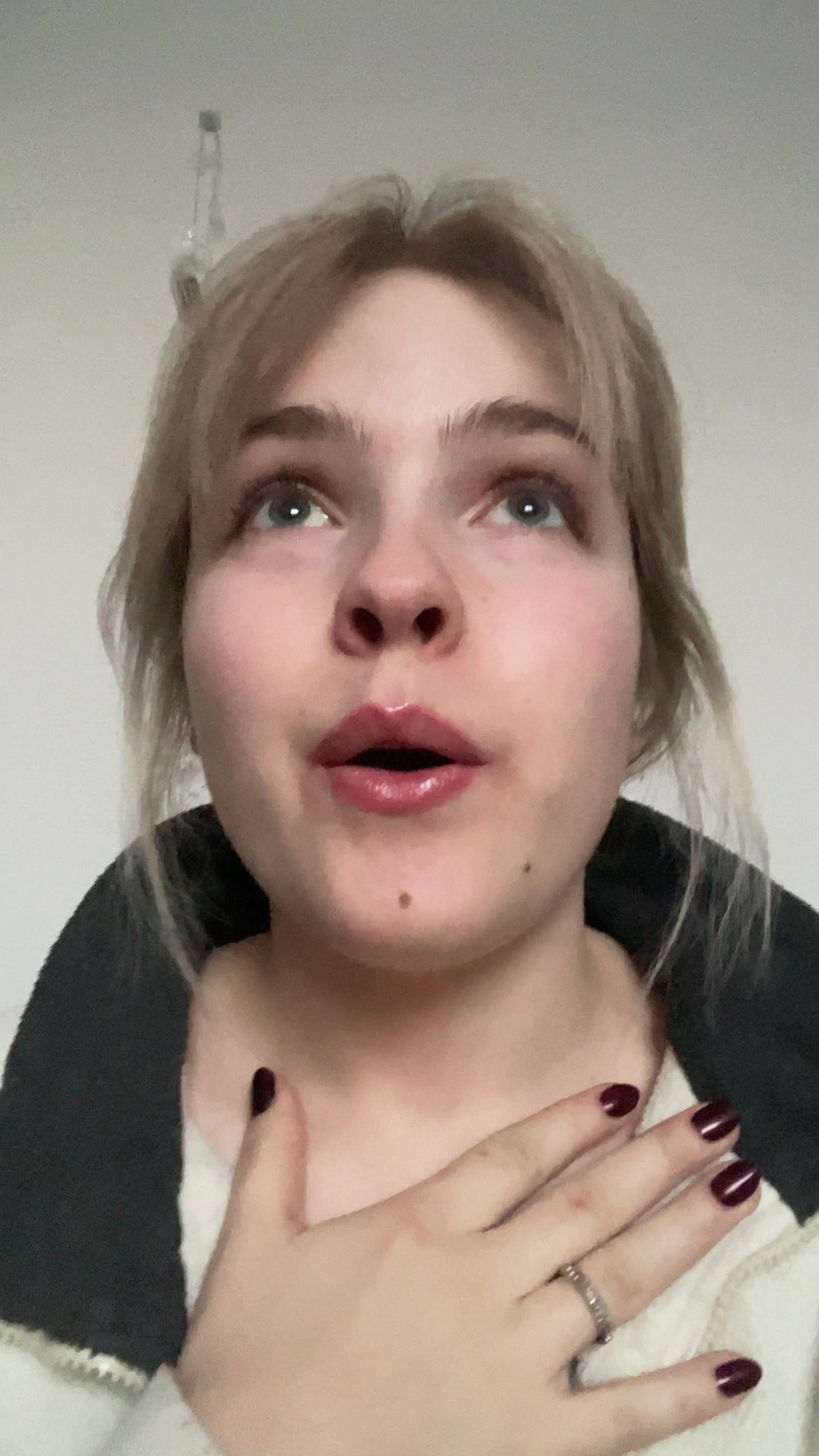 Young woman playful, confused reaction