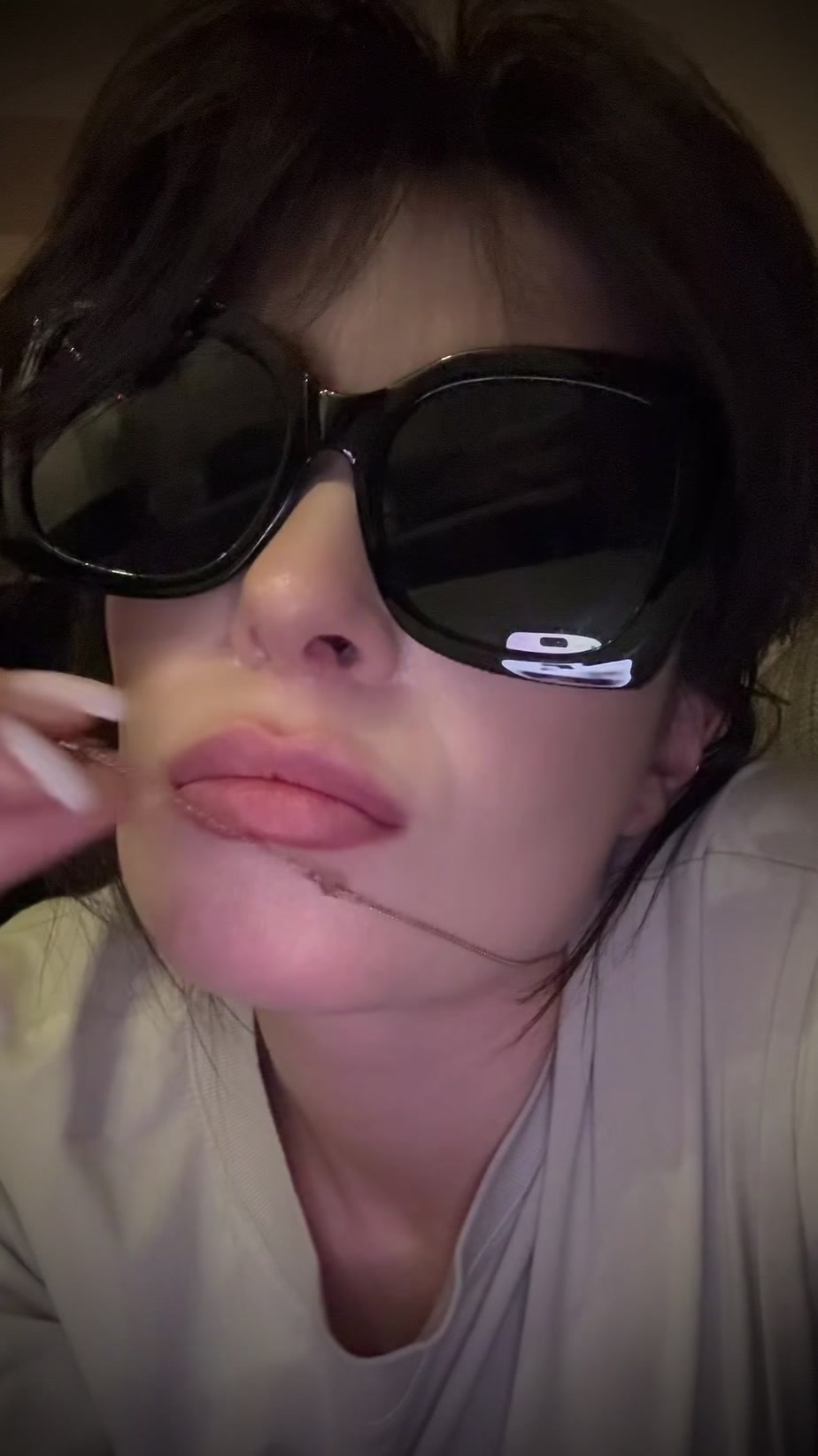 Confident Woman Posing in Sunglasses