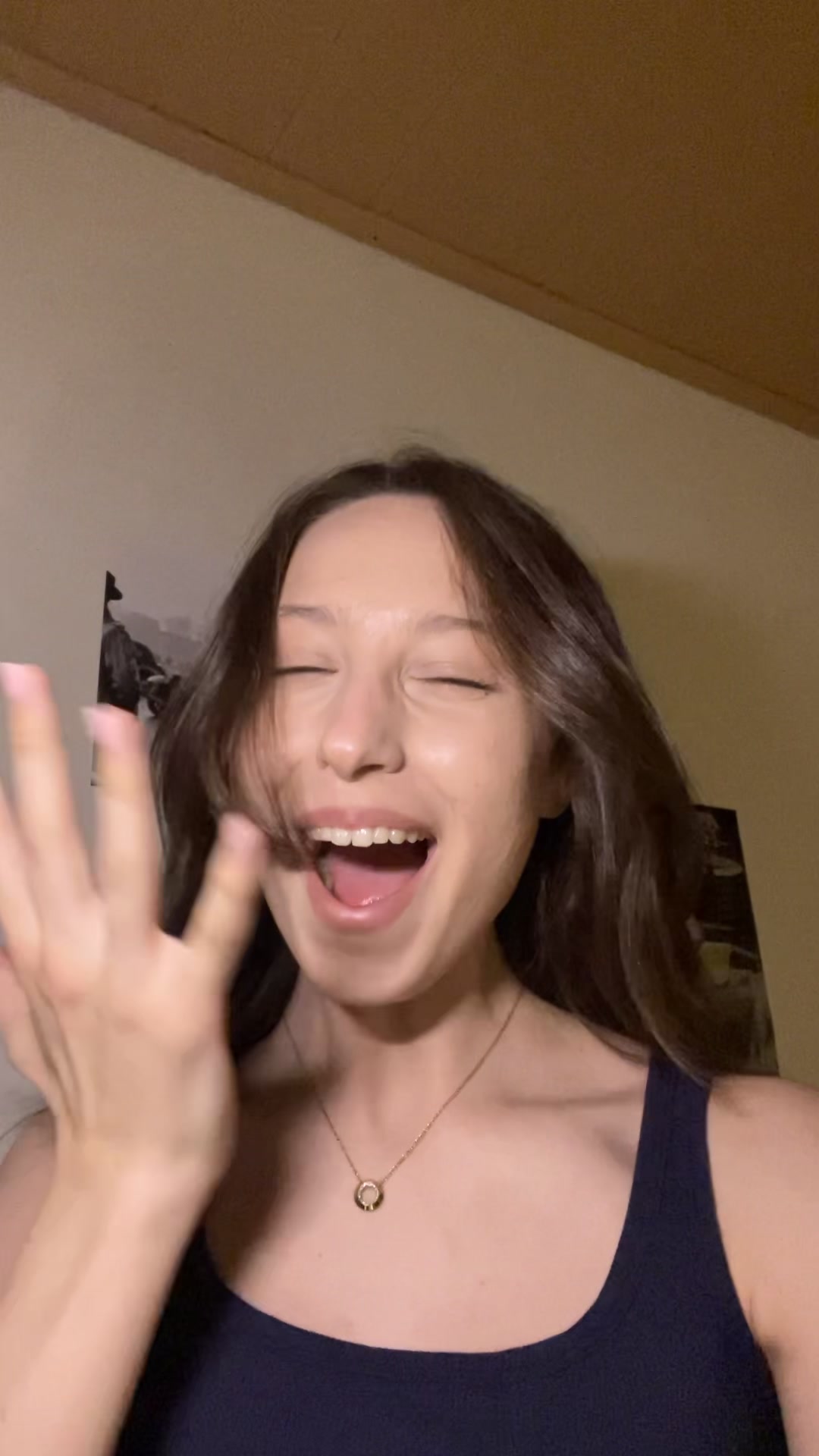 Girl Laughing and Playing with Hair