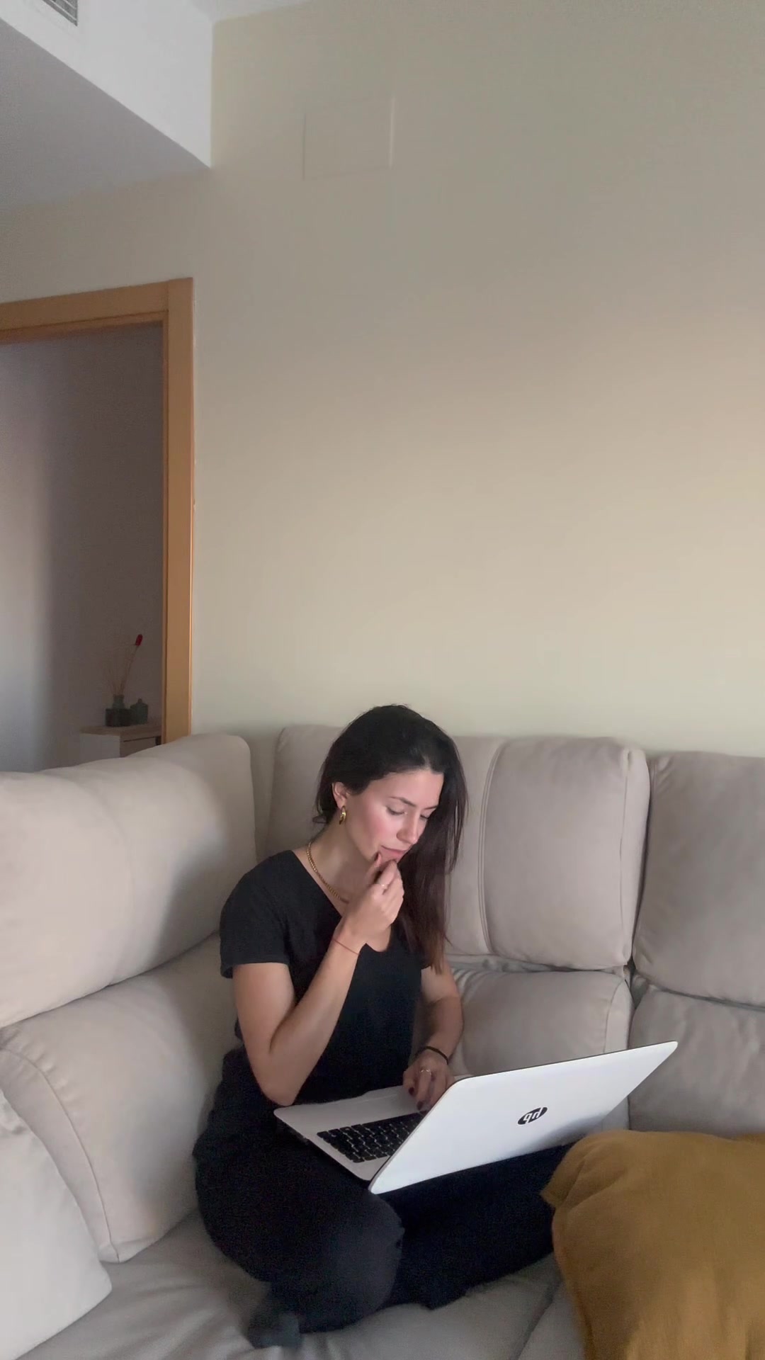 Woman Reacts Happily to Laptop