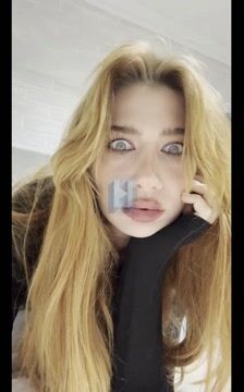 Girl Reacts With Shocked Expression